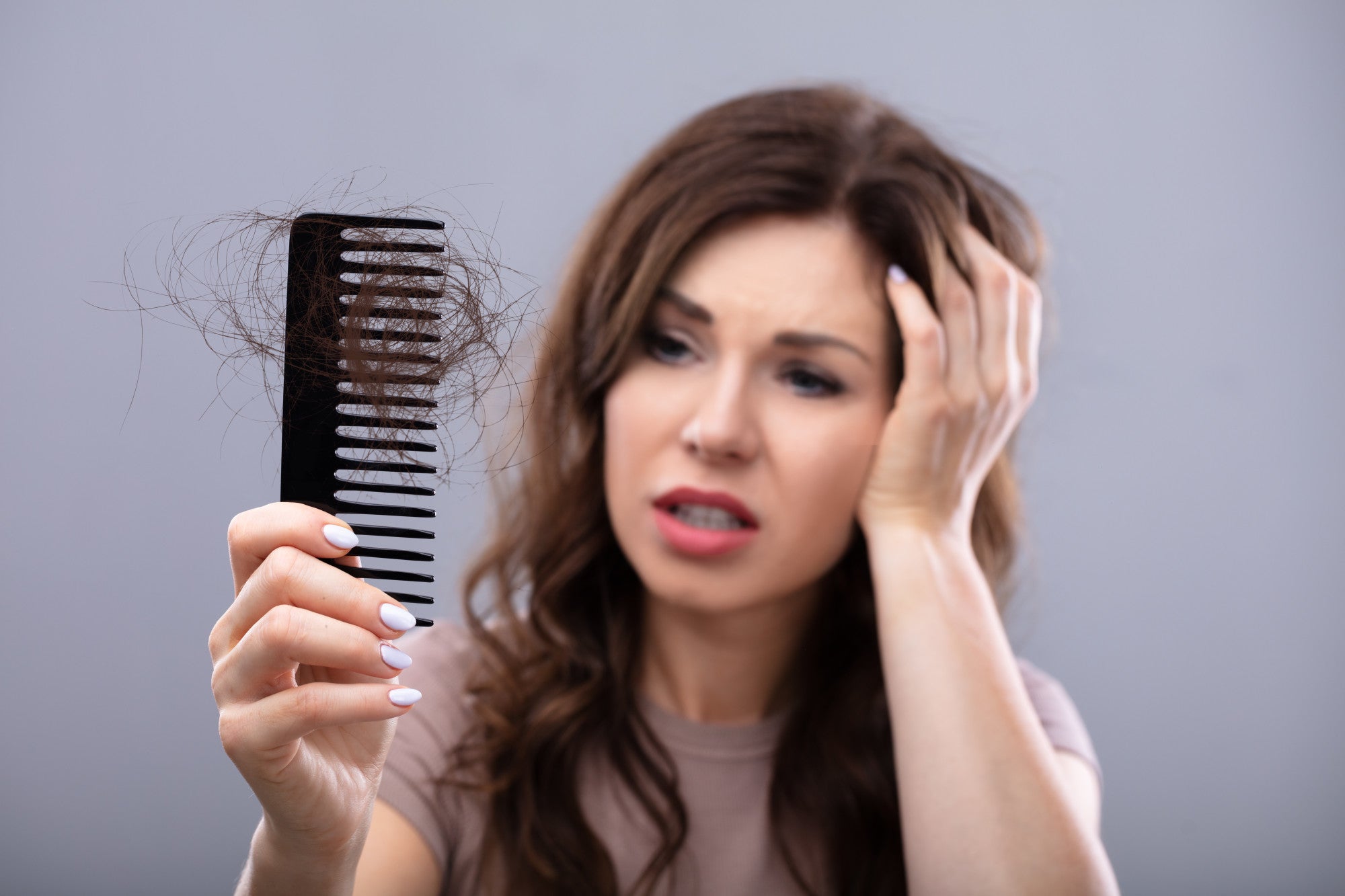What causes flat hair?